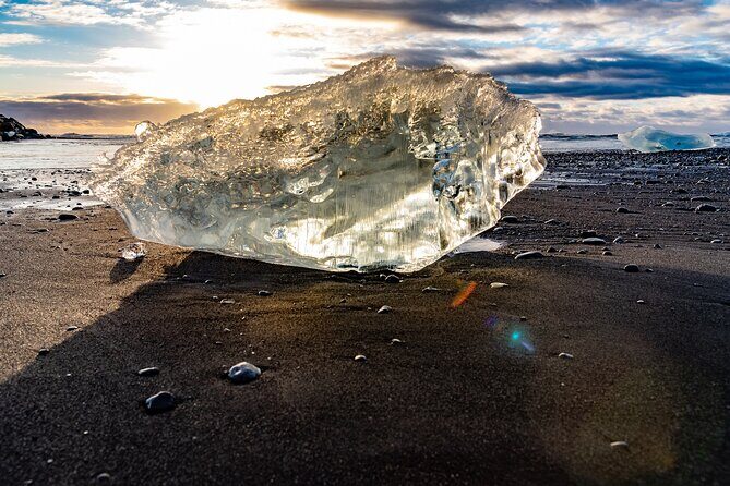 Diamond Beach & Jökulsárlón Floating Glacier Guided Day Tour - Vatnajökull National Park: Panoramic Glacier Views From the Deck