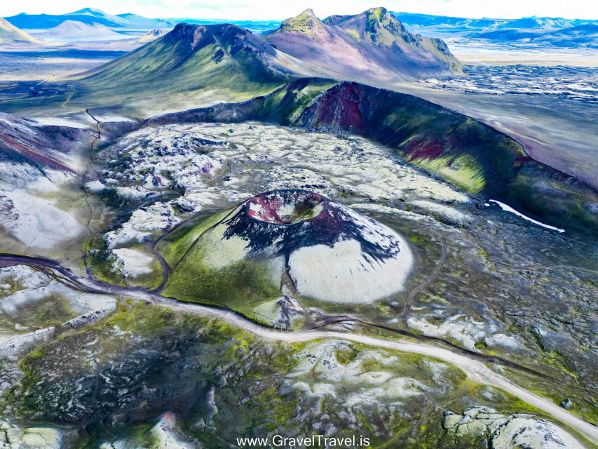 From Reykjavik: Day Tour to Landmannalaugar in a Super Jeep - Hnausapollur and Ljótipollur: blue crater water that feels unreal