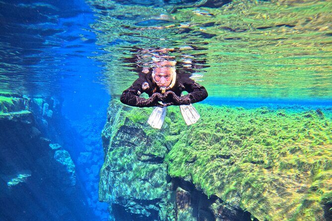 From Reykjavik- Silfra Snorkeling transfer included - Post-Snorkeling Warm-Up: Tea, Hot Chocolate, and Chocolate Bars