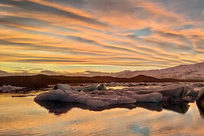 Glacier Lagoon, Diamond Beach, Black Sand Beaches and Waterfalls - Dyrhólaey viewpoint: volcanic origin and coastal bird-eye views