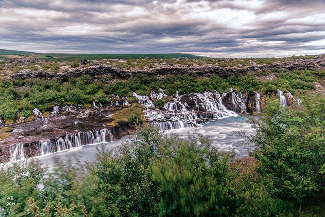 Icelandic Sagas and Glacier Cave Private Tour from Reykjavik - Hot Springs and Waterfalls: Deildartunguhver and Hraunfossar