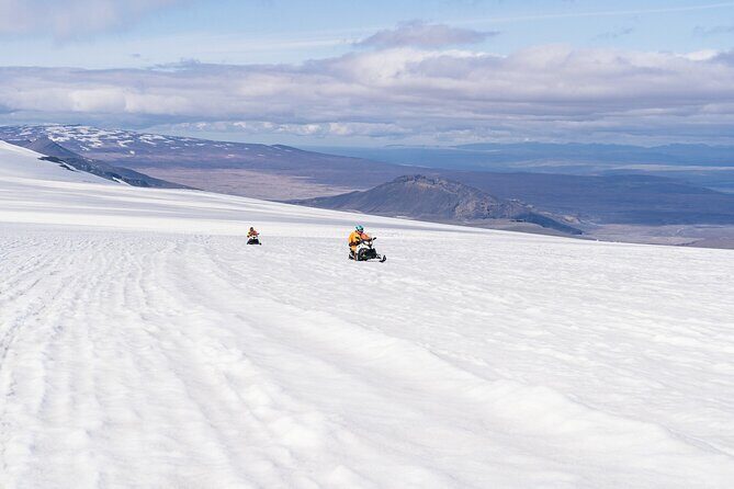 Into the Glacier Combo: Snowmobiling + Langjökull Ice Cave - Snowmobiling on shared machines: faster learning, smarter logistics