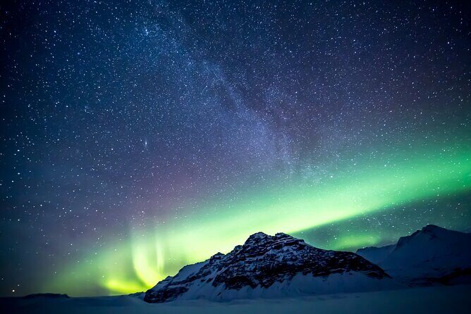 Northern Lights Small-Group Tour with Free Photos & Hot Chocolate - Pickup timing, bus stops, and the late-night reality