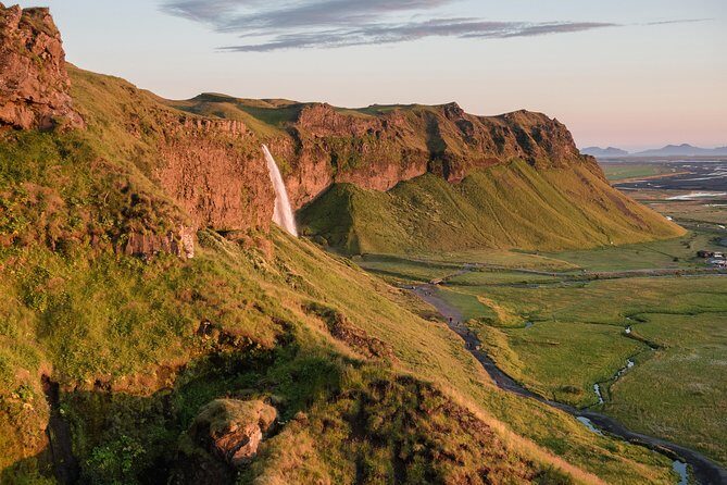 Private South Coast & Glacier Lagoon tour from Reykjavik - Skógafoss: the 70-meter drop that can swallow your sense of scale