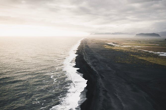 Private South Coast tour in Iceland - Reynisfjara black sand beach: basalt stacks and roaring Atlantic energy