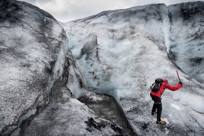 Private South Coast tour with Glacier walk - Solheimajökull glacier walk: gear, steps, and wind