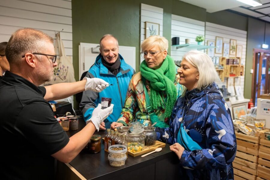 Reykjavik: Christmas Walking Tour with Icelandic Traditions - Laugavegur’s holiday shopping street and the little Christmas store