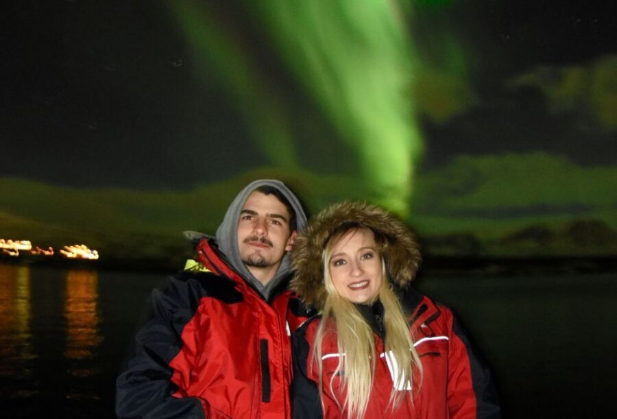 Reykjavík: Northern Lights Cruise - Boarding with comfort: warm overalls, heated cabin, and real viewing space