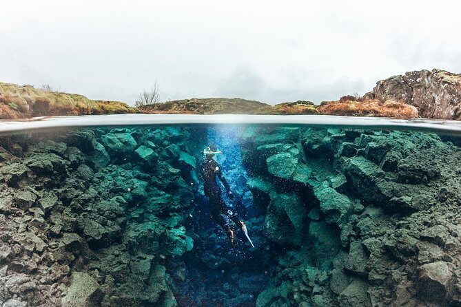 Silfra Wetsuit Snorkeling Tour with Underwater Photos - From Reykjavik - Snorkeling in Silfra: the tectonic-plate experience with 100m visibility