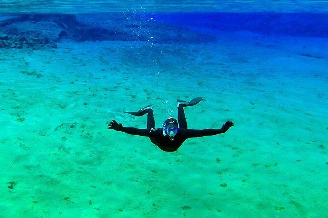 Silfra Wetsuit Snorkeling Tour with Underwater Photos - From Reykjavik - Hot chocolate and free underwater photos you’ll actually use