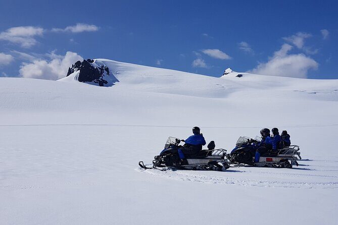 Snowmobile tour on Vatnajökull - Jöklasel and the ride back: glacier education on the way down