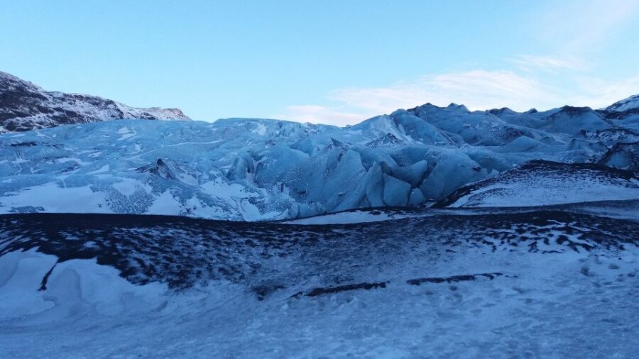 Sólheimajökull Ice Climbing Tour - Parking lot gear setup: crampons, harness, helmet, then your first lesson