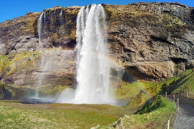 South Coast. Private Day Tour from Reykjavik - Skógafoss: stairs, spray rainbows, and a smart lunch break