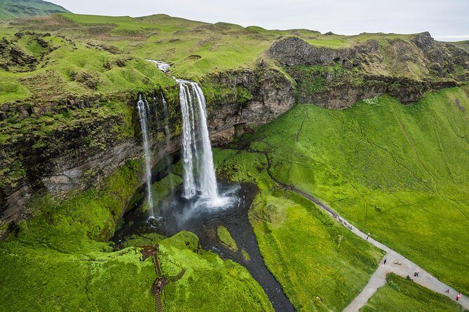 South Coast, Reynisfjara Beach & Waterfalls Small-Group Day Trip from Reykjavik - Vik on a Schedule: War Memorial, Wool, and Red-Roof Church