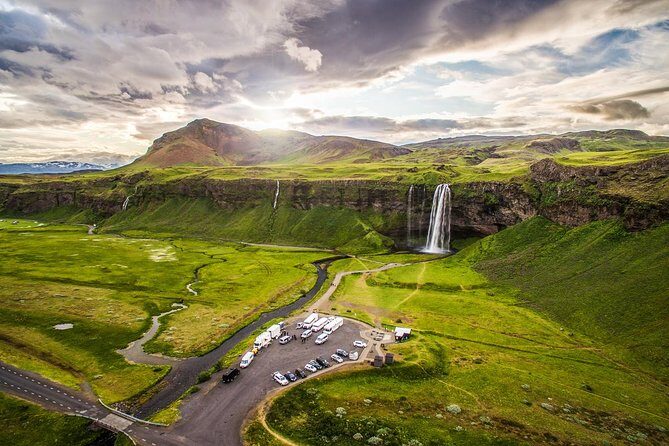 South Iceland, Glacier and Black Sand Beach Small Group Tour - Sólheimajökull glacier walk: boots, wind, and the touch test