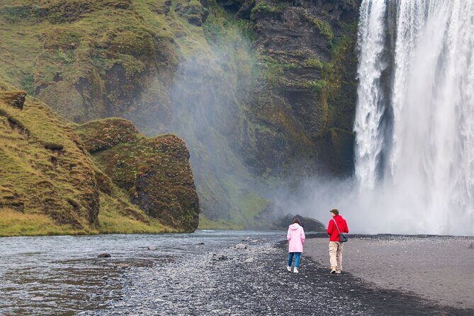 South Iceland, Glacier and Black Sand Beach Small Group Tour - Skógafoss stairs and the Eyjafjallajökull sight check