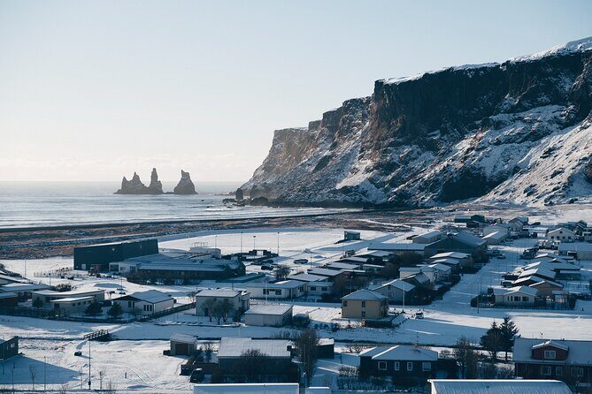 South Iceland Highlights and Northern Lights Combo Full-Day Tour - Sólheimajökull Glacier Walk: Close to Ice, With a Climate Message