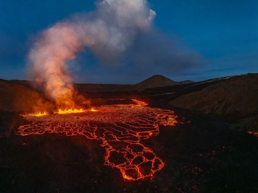 Volcano Exhibition and Cinema - Lava Centre Iceland - Watching eruption video: Grindavík and Blue Lagoon on screen